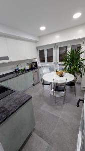 Kuchyň nebo kuchyňský kout v ubytování Nuevo Apartamento en Calatayud