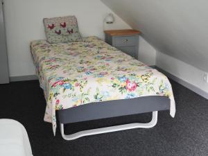 Cama o camas de una habitación en Skovgårdens Apartment