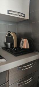 a toaster sitting on top of a kitchen counter at Urban 34 - station & centre in Treviso