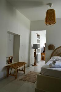 Ένα ή περισσότερα κρεβάτια σε δωμάτιο στο Guesthouse Evilia +47 φωτογραφίες