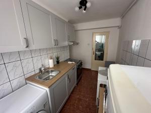 Nhà bếp/bếp nhỏ tại Planet Nine Apartment +30 ảnh