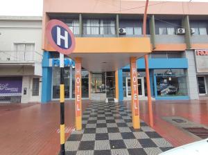 a building with a checkered floor in front of it at Hotel Viñas San Rafael in San Rafael