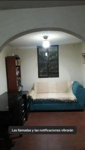 Istumisnurk majutusasutuses Habitacion en apartamento en los alcazares cali