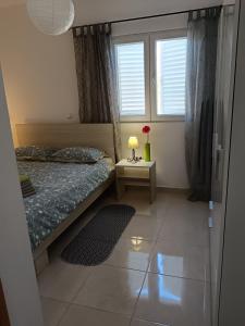 Posteľ alebo postele v izbe v ubytovaní Apartment Marijan - Rtina + 37 fotografií