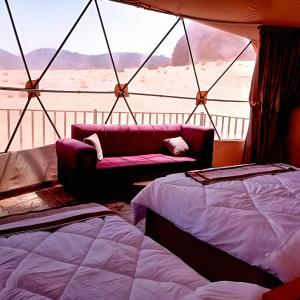 Postel nebo postele na pokoji v ubytování Wadi rum vaggie camp + 37 fotografií