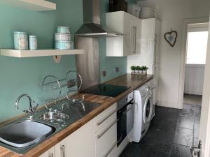 Fotografie z fotogalerie ubytování Large detached 3 bedroom house v destinaci Corkey