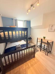 Katil atau katil-katil dalam bilik di Tottenham En Suites Guest Rooms +44 gambar