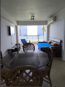 TV a/nebo společenská místnost v ubytování Confortable Apartamento de Playa en Los Corales - La Guaira + 20 fotografií