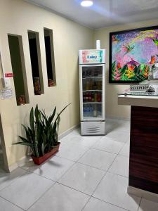 Kuchyň nebo kuchyňský kout v ubytování HOTEL KINDI Orito