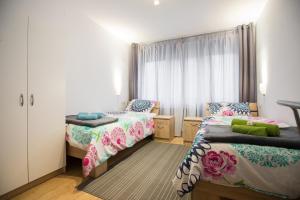 Postel nebo postele na pokoji v ubytování Apartment Max