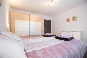 Postel nebo postele na pokoji v ubytování Apartment Max