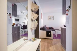 Kuchyň nebo kuchyňský kout v ubytování Apartment Max