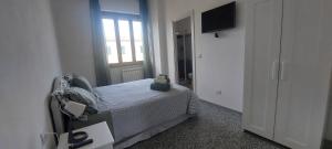 TV a/nebo společenská místnost v ubytování Emerald Room Pisa