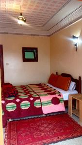 Postel nebo postele na pokoji v ubytování Hotel Almanader