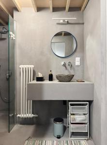 a bathroom with a sink and a mirror at Stepono Apartment in Vilnius