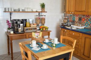 Kuchyň nebo kuchyňský kout v ubytování MIU' Bed and Breakfast