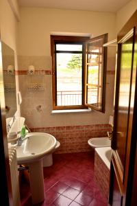 Ένα μπάνιο στο Albergo Di Murlo