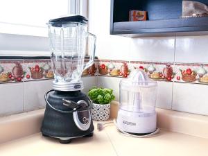 a blender sitting on top of a kitchen counter at Casa Boutique Sabu in Oaxaca City