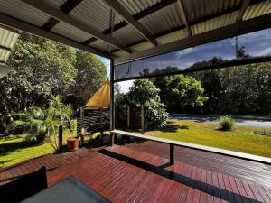 a view from the deck of a house with a view at Rainbow North - Rainbow Beach in Rainbow Beach