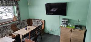 Kuchyň nebo kuchyňský kout v ubytování apartmány Špacír