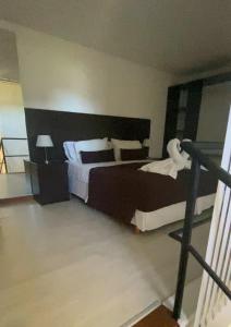 Cama ou camas em um quarto em View Hotel BRC