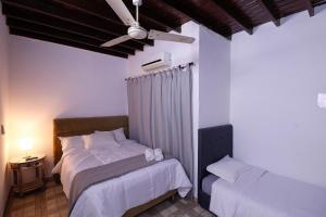 Vuode tai vuoteita majoituspaikassa Habitación privada con WiFi, desayuno y excelente ubicación en Asunción