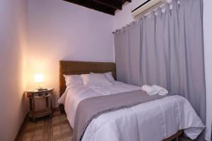 Vuode tai vuoteita majoituspaikassa Habitación privada con WiFi, desayuno y excelente ubicación en Asunción