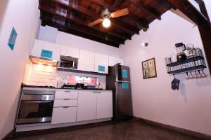 Majoituspaikan Habitación privada con WiFi, desayuno y excelente ubicación en Asunción keittiö tai keittotila