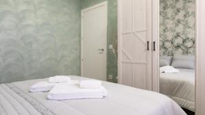 Łóżko lub łóżka w pokoju w obiekcie Apartamentos La Chaparrina del Jerte