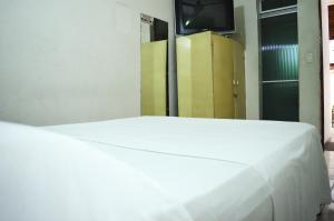 Postel nebo postele na pokoji v ubytování Hotel Terraza Girardot