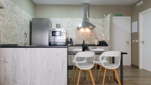 Kuchnia lub aneks kuchenny w obiekcie Apartamentos La Chaparrina del Jerte