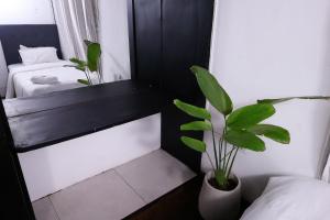 سرير أو أسرّة في غرفة في Altillo privado con desayuno artesanal en pleno centro