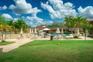 Taman di luar Flat com vista Lago e piscina aquecida
