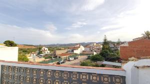 a view of a city from a balcony at La Replaceta in Segorbe