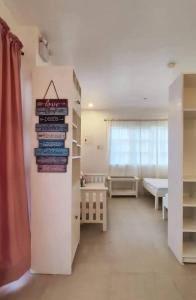 Postel nebo postele na pokoji v ubytování Tinir Transient Inn Coron Town - 3 to 4pax