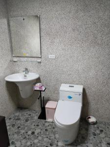 Vannituba majutusasutuses Shi Qian Zai Homestay