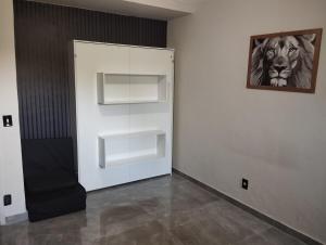 Katil atau katil-katil dalam bilik di Loft Reserva do Pontal +3 gambar
