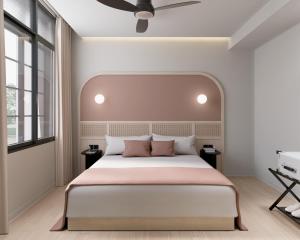 Voodi või voodid majutusasutuse The Initial Sama Serviced Residences toas