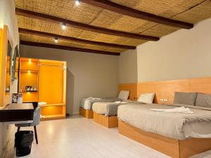 Postel nebo postele na pokoji v ubytování Pyramids NUT INN