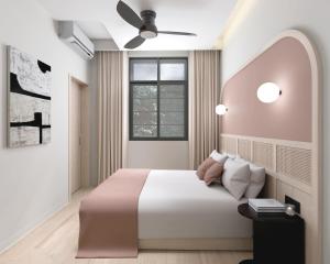 Voodi või voodid majutusasutuse The Initial Sama Serviced Residences toas