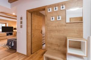 Telewizja i/lub zestaw kina domowego w obiekcie Luxury Chalet Mallnitz