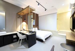 TV a/nebo společenská místnost v ubytování Almond Hotel Busan Station