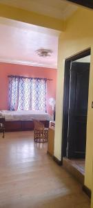 Postel nebo postele na pokoji v ubytování Heritage View Homestay