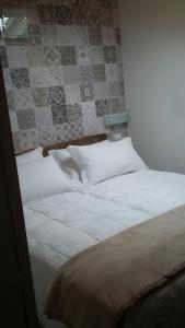 Een bed of bedden in een kamer bij Antica Osteria del Mirasole