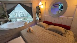 Só Mulheres Cobertura Duplex Alto Padrão Shows Ginásio Parque Ibirapuera Jardins Av Paulista Paraíso Vl Mariana客房内的一张或多张床位