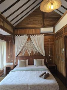 Little Elephant Cottage客房内的一张或多张床位