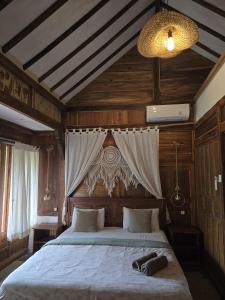Little Elephant Cottage客房内的一张或多张床位