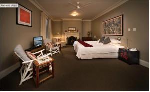 Athelstane Hotel客房内的一张或多张床位
