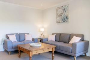 Ein Sitzbereich in der Unterkunft Mount Lofty Golf Course