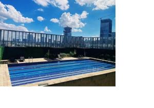 a swimming pool on top of a building at Pazhou Exhibition in Guangzhou